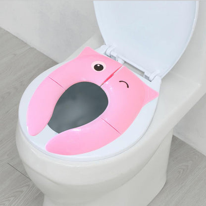 Detailed view of potty training seat in pink for travel use baby learning toy